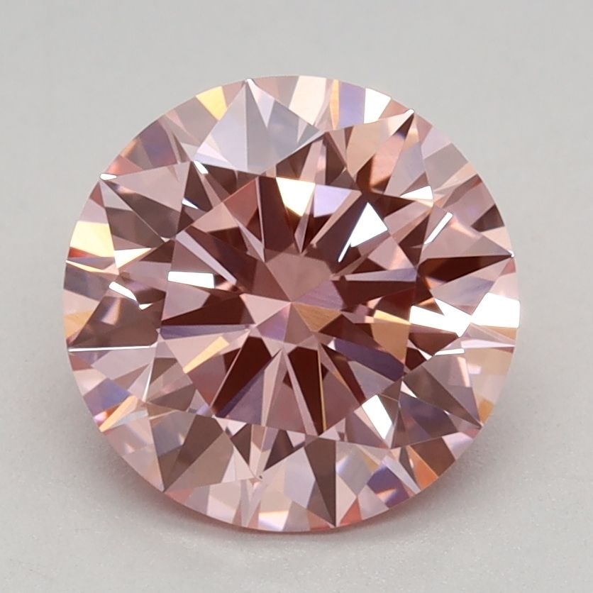 IGI Round 1.6ct Fancy Vivid Pink VVS2 Ideal Loose Lab Diamond: IGI Round 1.6ct Fancy Vivid Pink VVS2 Ideal Loose Lab Diamond Experience the unparalleled beauty of a lab-grown diamond, certified by IGI as Fancy Vivid Pink with exceptional clarity and polish. This