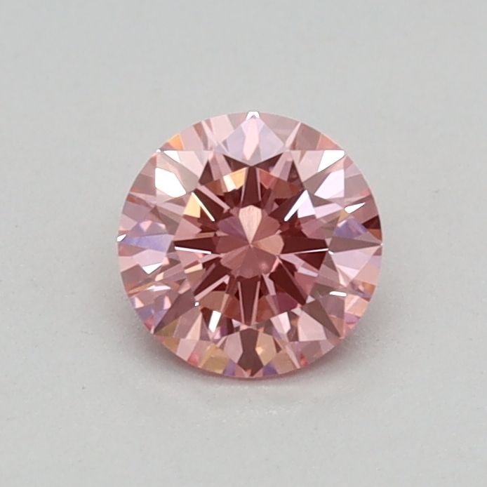 IGI Round 0.33ct Fancy Vivid Pink VVS2 Loose Lab Diamond: IGI Round 0.33ct Fancy Vivid Pink VVS2 Loose Lab Diamond Experience the beauty of nature in a lab-grown wonder, this 0.33ct Fancy Vivid Pink VVS2 loose diamond shines with exceptional clarity and colo