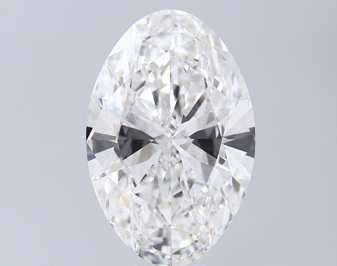 IGI Oval 14.01ct G VVS2 Loose Lab Diamond: IGI Oval 14.01ct G VVS2 Loose Lab Diamond Experience the brilliance of nature's own masterpiece, a lab-grown diamond of exceptional quality. This stunning 14.01ct G VVS2 oval-cut gemstone boasts an im