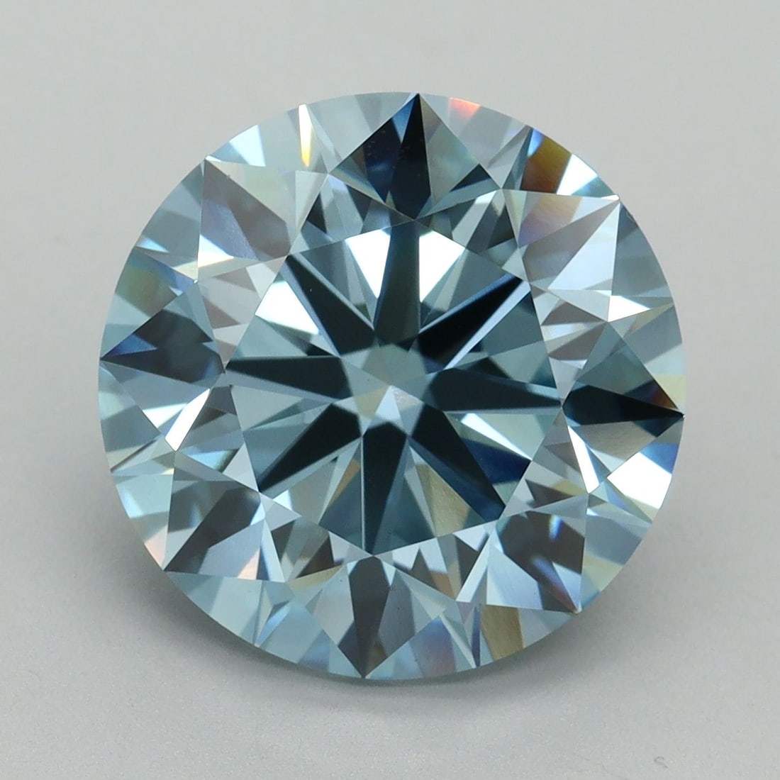 IGI Round 7.06ct Fancy Vivid Blue VVS2 Ideal Loose Lab Diamond: IGI Round 7.06ct Fancy Vivid Blue VVS2 Ideal Loose Lab Diamond Experience the breathtaking beauty of a lab-grown Fancy Vivid Blue diamond, certified by IGI and boasting exceptional clarity (VVS2) and
