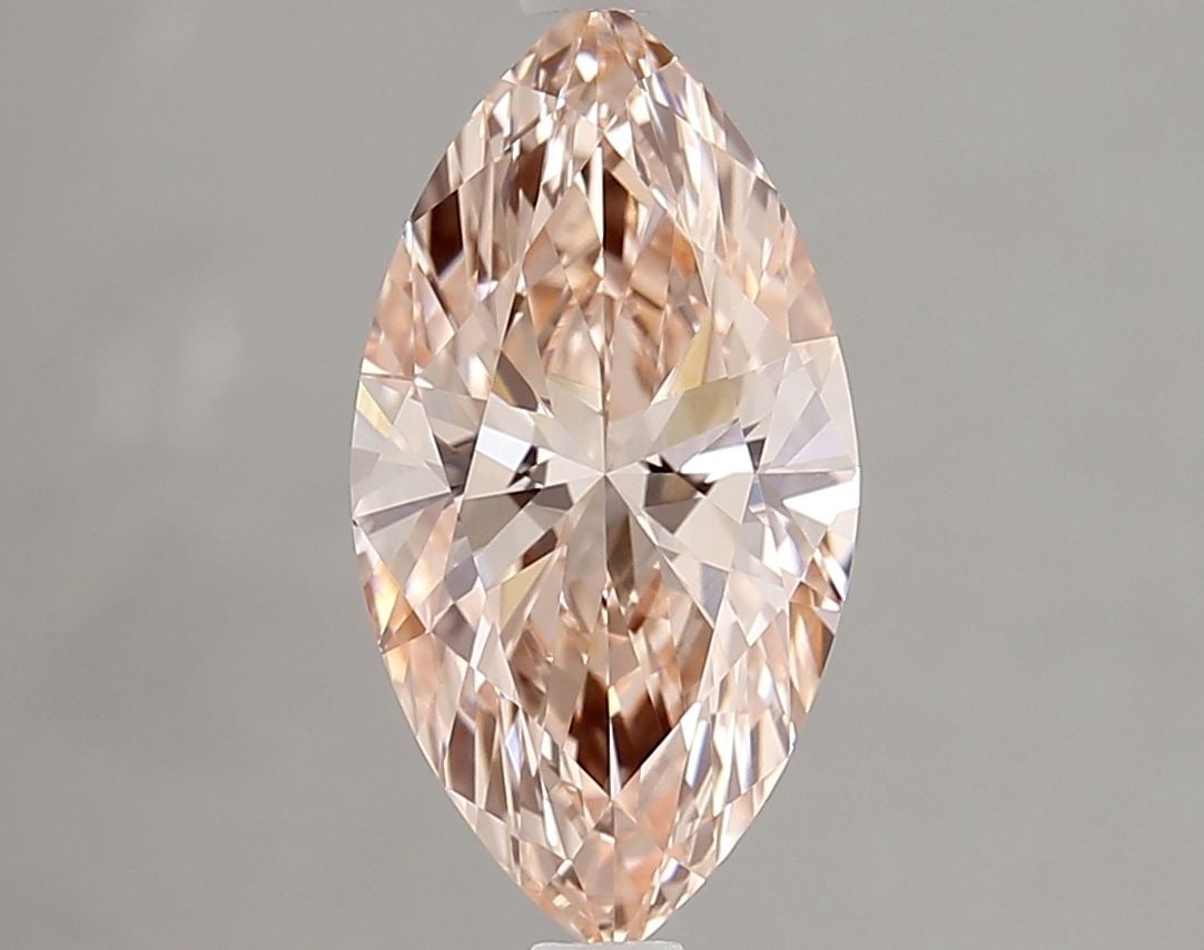 IGI Marquise 2.09ct Fancy Vivid Pink VVS2 Loose Lab Diamond: IGI Marquise 2.09ct Fancy Vivid Pink VVS2 Loose Lab Diamond Experience the rare beauty of a Fancy Vivid Pink diamond, one of the most coveted colors in the world of gemstones. This exquisite 2.09ct la