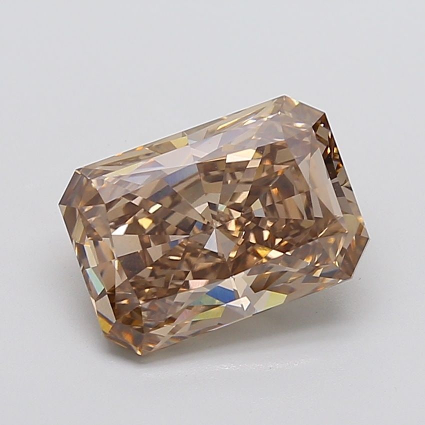 IGI Radiant 5.39ct Fancy Brown VVS2 Loose Lab Diamond: IGI Radiant 5.39ct Fancy Brown VVS2 Loose Lab Diamond Experience the beauty of a lab-grown diamond, certified by IGI as Fancy Brown VVS2, with exceptional cut, color, and clarity. This 5.39ct gem shin