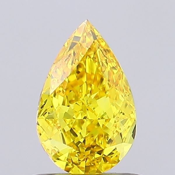 Loose Lab Diamond - IGI Pear 0.74ct Fancy Vivid Yellow VVS1: Loose Lab Diamond - IGI Pear 0.74ct Fancy Vivid Yellow VVS1 Experience the brilliance of nature, reimagined in a lab-grown diamond that rivals its mined counterparts. This stunning 0.74ct Fancy Vivid