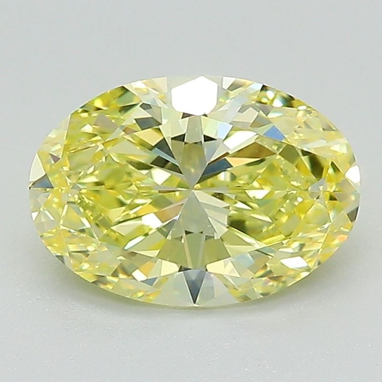 IGI Oval 1.58ct Fancy Vivid Yellow VVS2 Loose Lab Diamond: IGI Oval 1.58ct Fancy Vivid Yellow VVS2 Loose Lab Diamond Experience the vibrant beauty of nature with this stunning 1.58ct Fancy Vivid Yellow VVS2 loose lab diamond, certified by the International Ge