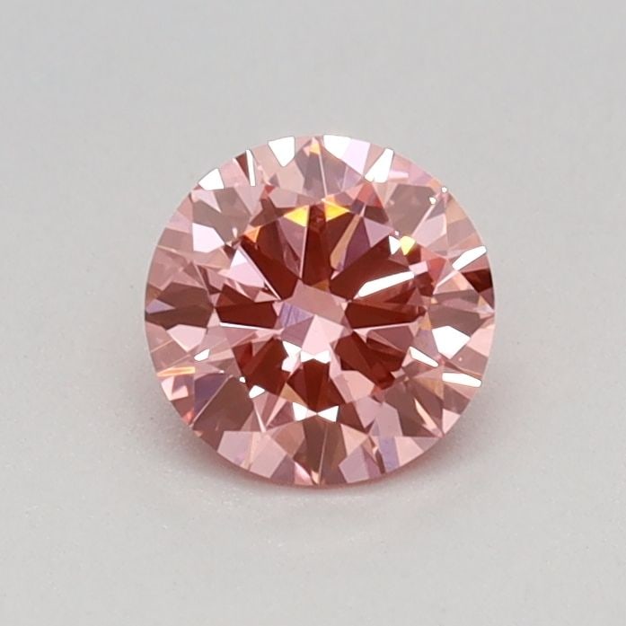 IGI Round 0.36ct Fancy Vivid Pink VVS2 Loose Lab Diamond: IGI Round 0.36ct Fancy Vivid Pink VVS2 Loose Lab Diamond Experience the beauty of a lab-grown diamond, certified by IGI as Fancy Vivid Pink with exceptional clarity and cut. This 0.36ct gem boasts an
