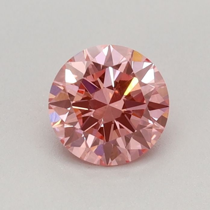 IGI Round 0.41ct Fancy Vivid Pink VVS2 Loose Lab Diamond: IGI Round 0.41ct Fancy Vivid Pink VVS2 Loose Lab Diamond Experience the rare beauty of a Fancy Vivid Pink diamond, one of the most coveted colors in the world of gemstones. This exquisite 0.41ct lab-g