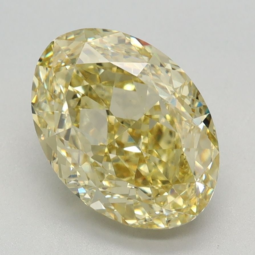 IGI Oval 2.74ct Fancy Intense Yellow VVS2 Loose Lab Diamond: IGI Oval 2.74ct Fancy Intense Yellow VVS2 Loose Lab Diamond Experience the warmth and vibrancy of this stunning Fancy Intense Yellow VVS2 loose lab diamond, boasting an impressive 2.74 carats of vibra