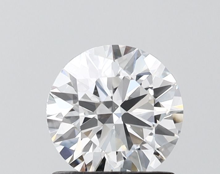 IGI Round 1.02ct D VVS2 Ideal Loose Lab Diamond: IGI Round 1.02ct D VVS2 Ideal Loose Lab Diamond Experience the brilliance of a lab-grown diamond, certified by IGI as a 1.02ct D VVS2 Ideal Round, boasting exceptional clarity and cut quality. This