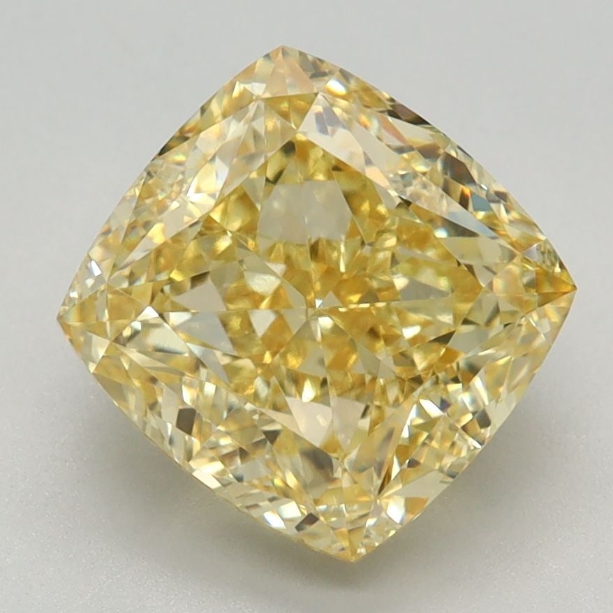 IGI Cushion Modified 3.2ct Fancy Intense Yellow VVS1 Loose Lab Diamond: IGI Cushion Modified 3.2ct Fancy Intense Yellow VVS1 Loose Lab Diamond Experience the vibrant warmth of a Fancy Intense Yellow diamond, one of the rarest and most coveted colors in nature. This 3.2ct