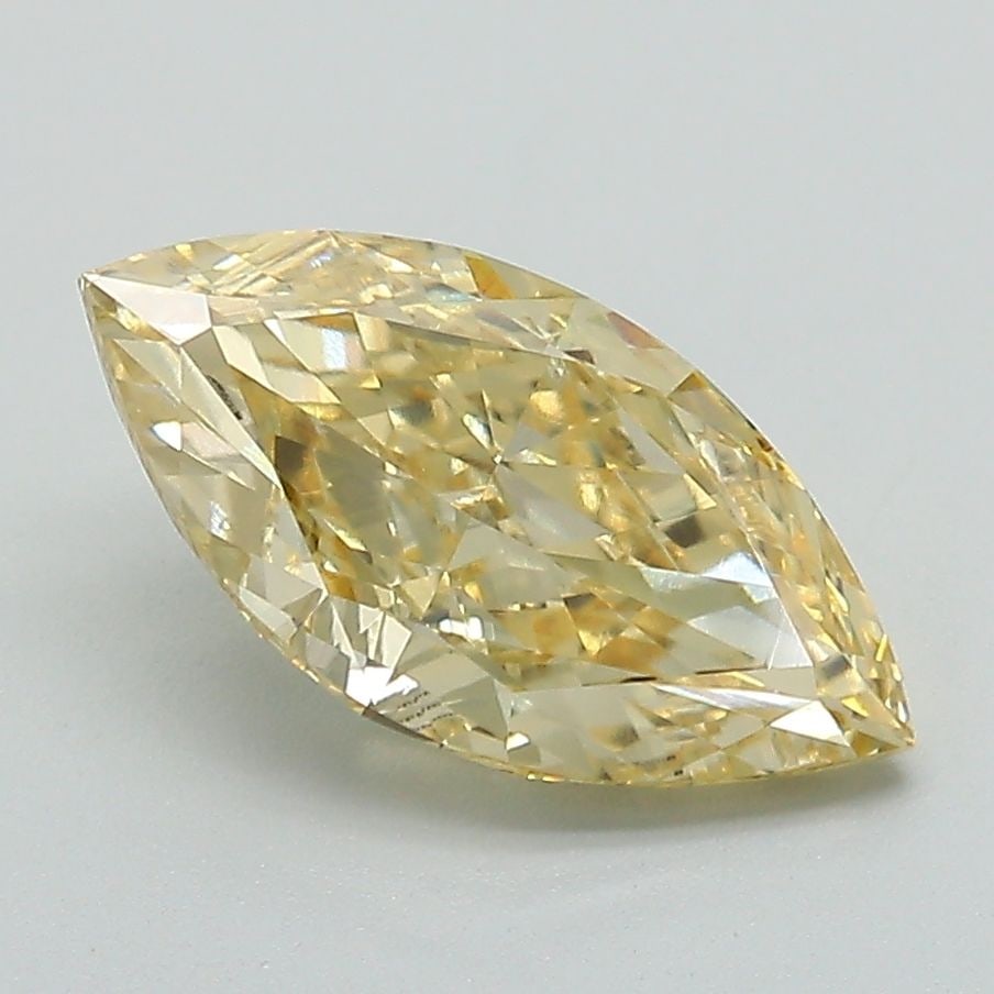 IGI Marquise 1.91ct Fancy Intense Yellow VVS2 Loose Lab Diamond: IGI Marquise 1.91ct Fancy Intense Yellow VVS2 Loose Lab Diamond Experience the vibrant beauty of nature with this stunning 1.91ct Fancy Intense Yellow VVS2 loose lab diamond, boasting exceptional clar