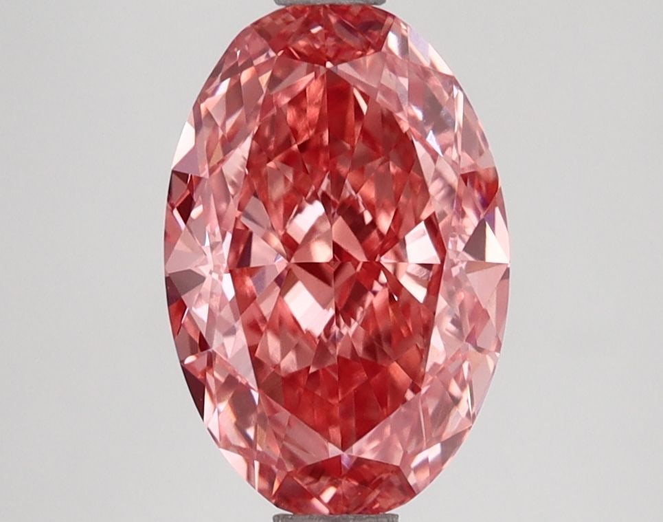 IGI Oval 2.5ct Fancy Vivid Pink VVS2 Loose Lab Diamond: IGI Oval 2.5ct Fancy Vivid Pink VVS2 Loose Lab Diamond This stunning 2.5ct Fancy Vivid Pink lab diamond boasts exceptional clarity and color, with a VVS2 certification for maximum brilliance. Its EX p