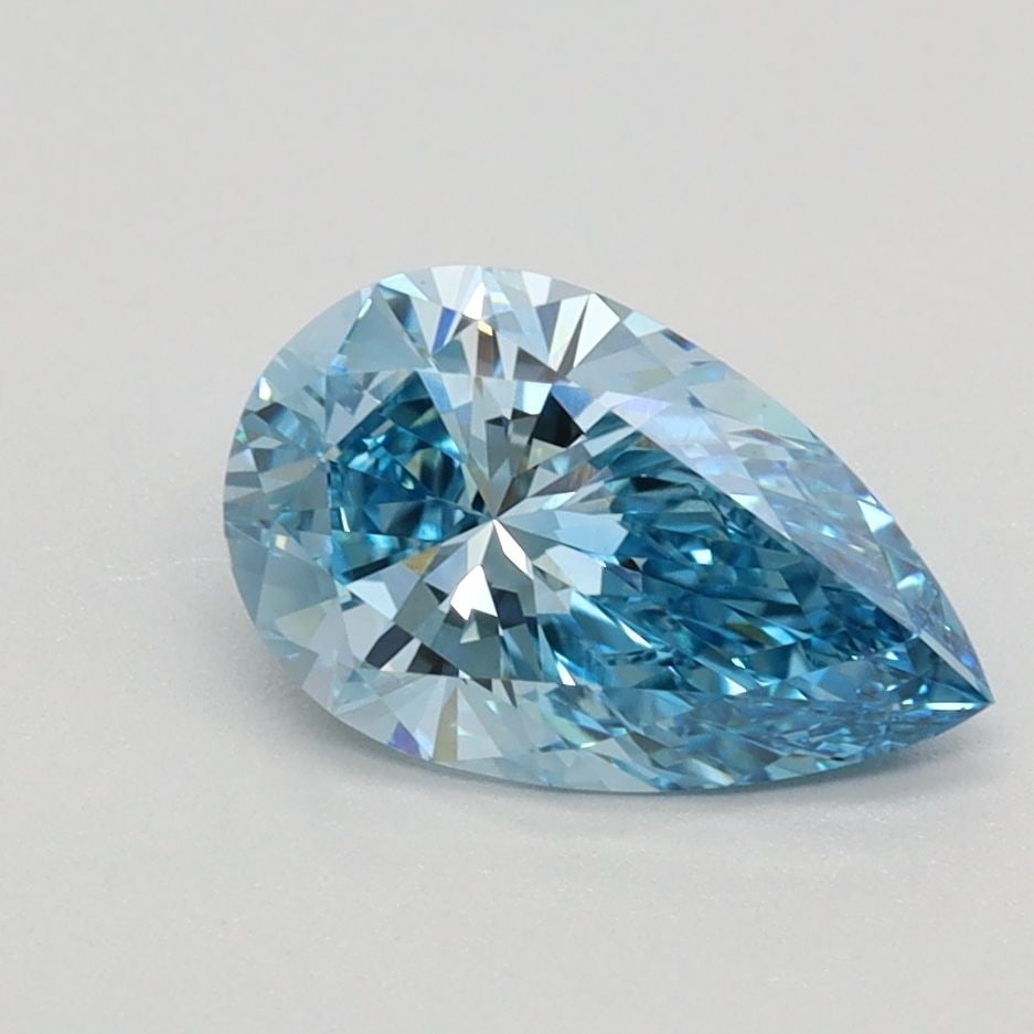 Loose Lab Diamond - IGI Pear 1.06ct Fancy Vivid Blue VVS2: Loose Lab Diamond - IGI Pear 1.06ct Fancy Vivid Blue VVS2 Experience the breathtaking beauty of a lab-grown diamond, certified by the International Gemological Institute (IGI) as Fancy Vivid Blue, wit