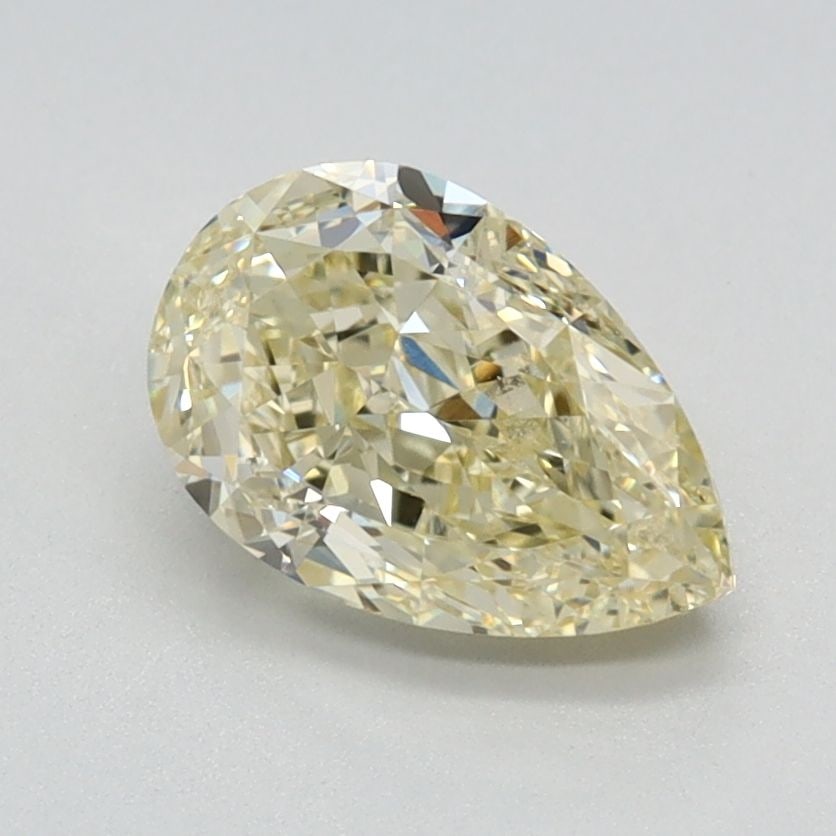 Loose Lab Diamond - IGI Pear 1.25ct Fancy Yellow VVS2: Loose Lab Diamond - IGI Pear 1.25ct Fancy Yellow VVS2 This stunning loose lab diamond boasts a vibrant Fancy Yellow hue, graded VVS2 for exceptional clarity and cut to perfection, with an EX polish an