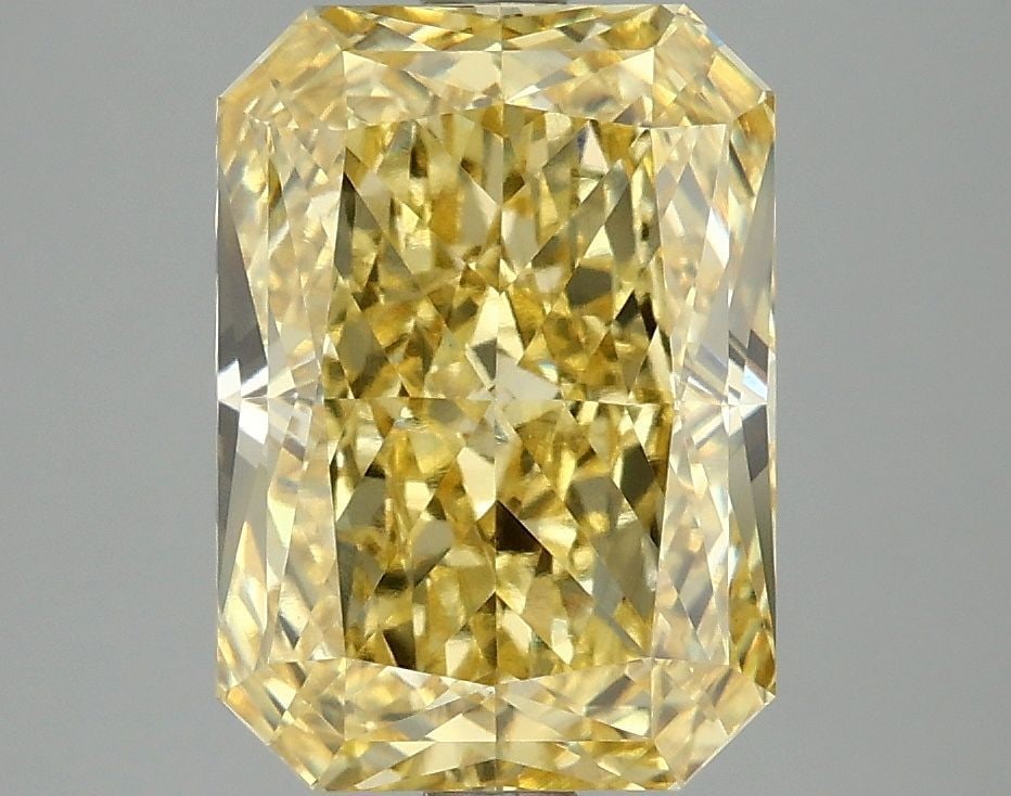IGI Radiant 4.09ct Fancy Vivid Yellow VVS2 Loose Lab Diamond: IGI Radiant 4.09ct Fancy Vivid Yellow VVS2 Loose Lab Diamond Experience the brilliance of nature's own sunshine with this stunning 4.09ct Fancy Vivid Yellow VVS2 loose lab diamond, certified by IGI an