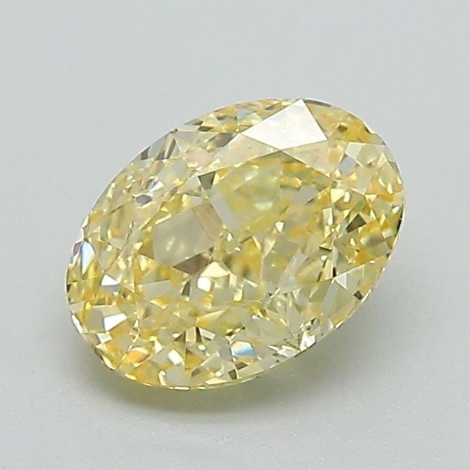 IGI Oval 1.05ct Fancy Vivid Yellow VVS2 Loose Lab Diamond: IGI Oval 1.05ct Fancy Vivid Yellow VVS2 Loose Lab Diamond Experience the warmth and brightness of a genuine lab-grown diamond, certified by IGI as Fancy Vivid Yellow with exceptional clarity (VVS2) an