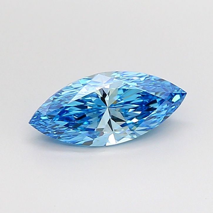 IGI Marquise 1.06ct Fancy Vivid Blue VVS2 Loose Lab Diamond: IGI Marquise 1.06ct Fancy Vivid Blue VVS2 Loose Lab Diamond Experience the breathtaking beauty of a Fancy Vivid Blue diamond, one of the rarest and most stunning colors in nature. This exquisite 1.06c