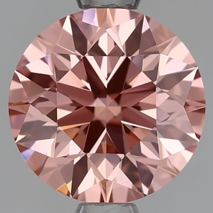 Loose Lab Diamond - Round 1.39ct Fancy Orangey Pink VVS2: Loose Lab Diamond - Round 1.39ct Fancy Orangey Pink VVS2 A stunning Fancy Orangey Pink lab diamond, weighing 1.39 carats, boasts exceptional clarity and polish, with a vibrant orange-pink hue that set
