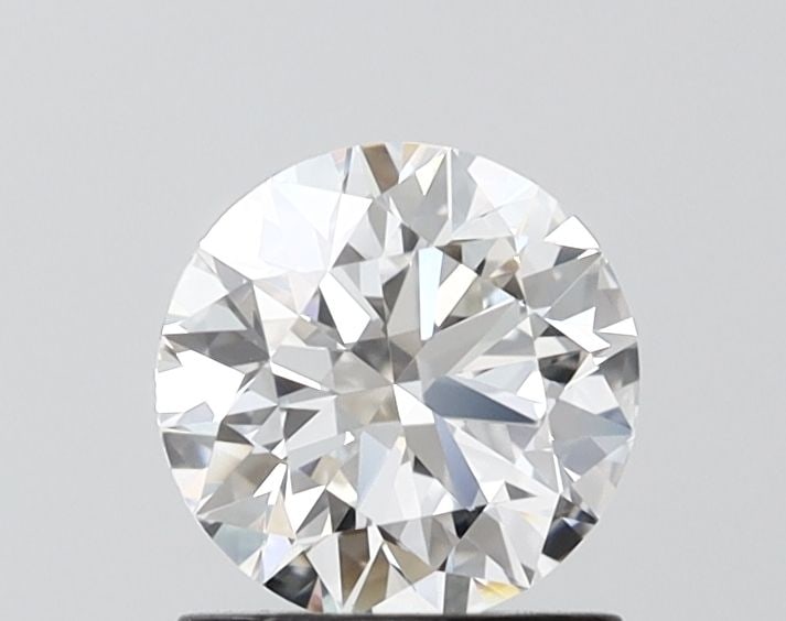 IGI Round 1.04ct E VVS2 Ideal Loose Lab Diamond: IGI Round 1.04ct E VVS2 Ideal Loose Lab Diamond This stunning IGI-certified lab-grown diamond boasts exceptional clarity and color, with a brilliant VVS2 grade and vibrant E hue that shines in the lig