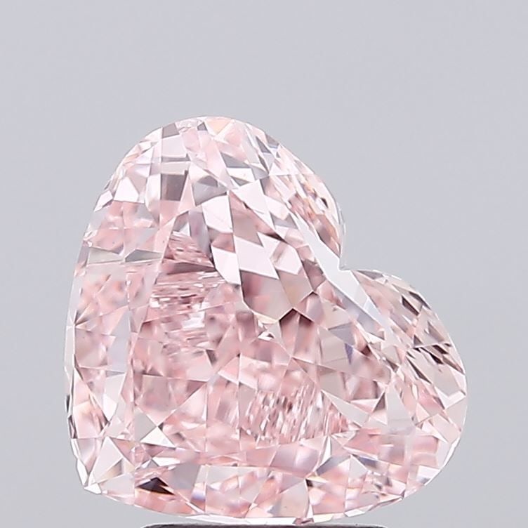 IGI Heart 4.0ct Fancy Vivid Pink VVS2 Loose Lab Diamond: IGI Heart 4.0ct Fancy Vivid Pink VVS2 Loose Lab Diamond Experience the rare beauty of a Fancy Vivid Pink diamond, one of the rarest and most coveted colors in nature. This exquisite 4.0ct lab-grown ge