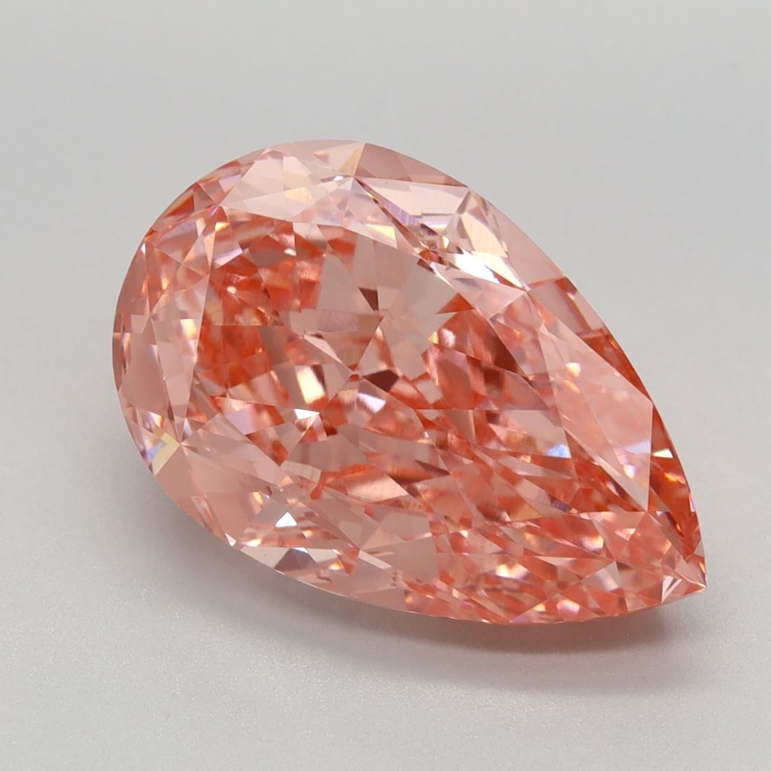 Loose Lab Diamond - IGI Pear 5.24ct Fancy Vivid Pink VVS2: Loose Lab Diamond - IGI Pear 5.24ct Fancy Vivid Pink VVS2 A rare and breathtakingly beautiful lab-grown diamond, this 5.24ct Fancy Vivid Pink gemstone boasts exceptional clarity (VVS2) and polish (EX)