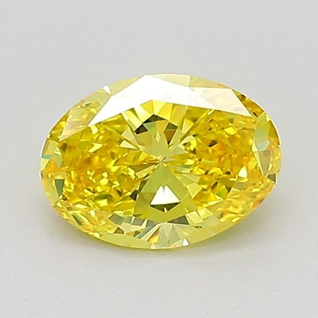 IGI Oval 0.69ct Fancy Vivid Yellow VVS2 Loose Lab Diamond: IGI Oval 0.69ct Fancy Vivid Yellow VVS2 Loose Lab Diamond Experience the brilliance of nature's own sunshine with this stunning 0.69ct Fancy Vivid Yellow VVS2 lab-grown diamond, certified by the Inter