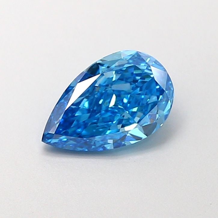 Loose Lab Diamond - IGI Pear 1.01ct Fancy Vivid Blue VVS2: Loose Lab Diamond - IGI Pear 1.01ct Fancy Vivid Blue VVS2 A stunning Fancy Vivid Blue lab diamond, certified by the International Gemological Institute (IGI), boasts exceptional clarity and polish wit