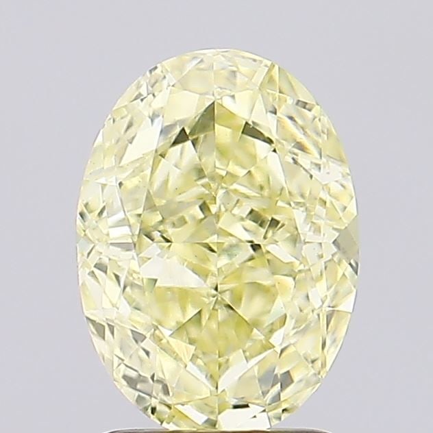 IGI Oval 1.51ct Fancy Yellow VVS2 Loose Lab Diamond: IGI Oval 1.51ct Fancy Yellow VVS2 Loose Lab Diamond Experience the unique warmth of a Fancy Yellow diamond, one of the rarest and most coveted colors in nature. This 1.51ct IGI-certified lab-grown gem