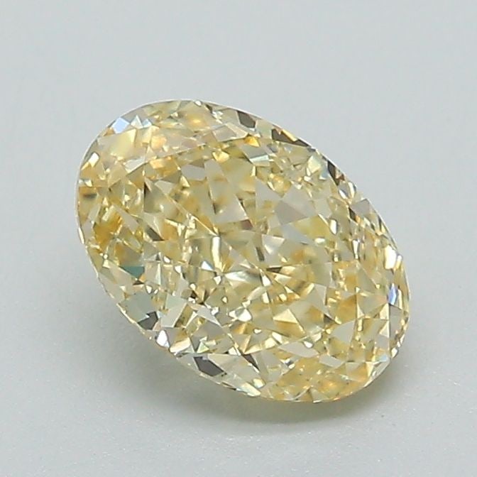 IGI Oval 1.04ct Fancy Intense Yellow VVS2 Loose Lab Diamond: IGI Oval 1.04ct Fancy Intense Yellow VVS2 Loose Lab Diamond Experience the vibrant beauty of nature with this stunning 1.04ct Fancy Intense Yellow VVS2 loose lab diamond, certified by the Internationa