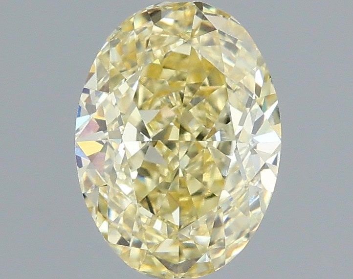 IGI Oval 1.52ct Fancy Light Yellow VVS2 Loose Lab Diamond: IGI Oval 1.52ct Fancy Light Yellow VVS2 Loose Lab Diamond A rare and radiant Fancy Light Yellow VVS2 lab diamond, certified by the International Gemological Institute (IGI), boasts exceptional clarity