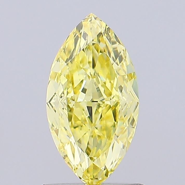 IGI Marquise 1.07ct Fancy Intense Yellow VVS2 Loose Lab Diamond: IGI Marquise 1.07ct Fancy Intense Yellow VVS2 Loose Lab Diamond Experience the vibrant beauty of nature in this stunning 1.07ct Fancy Intense Yellow VVS2 lab-grown diamond, boasting exceptional clarit