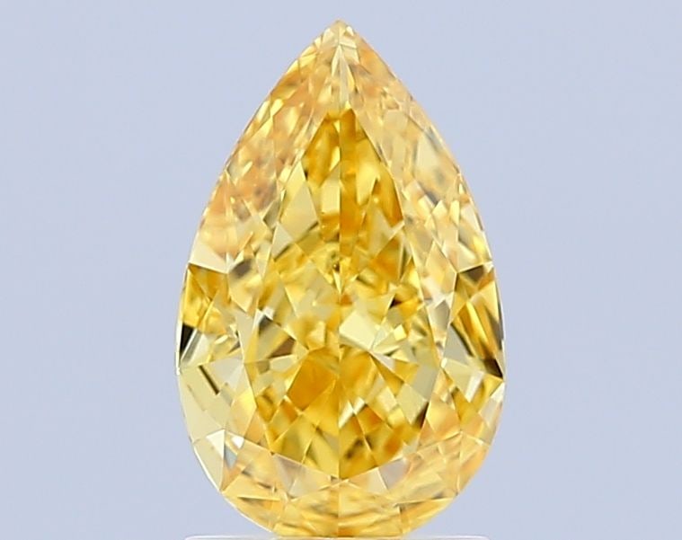 Loose Lab Diamond - IGI Pear 1.55ct Fancy Vivid Yellow VVS2: Loose Lab Diamond - IGI Pear 1.55ct Fancy Vivid Yellow VVS2 A truly unique and radiant gemstone, this 1.55ct Fancy Vivid Yellow Lab Diamond boasts exceptional clarity, precision-cut symmetry, and an u