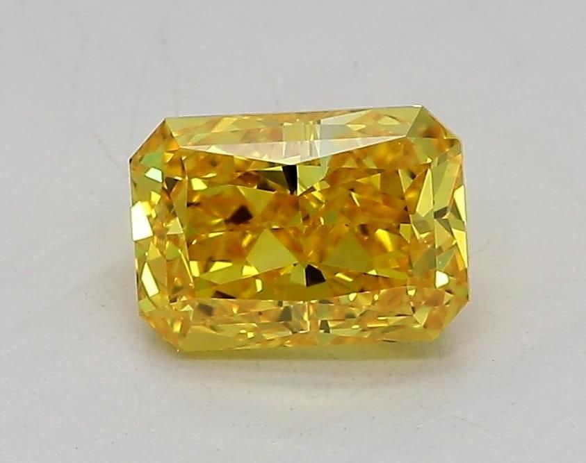 IGI Radiant 1.03ct Fancy Vivid Yellow VVS2 Loose Lab Diamond: IGI Radiant 1.03ct Fancy Vivid Yellow VVS2 Loose Lab Diamond Experience the exceptional brilliance of this 1.03ct Fancy Vivid Yellow VVS2 lab-grown diamond, boasting an EX polish and symmetry that sho