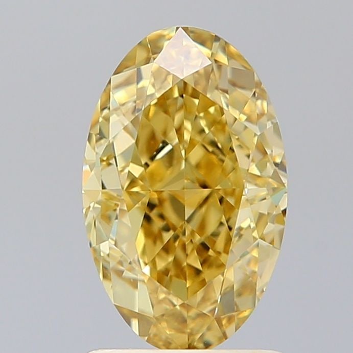 IGI Oval 1.71ct Fancy Vivid Yellow VVS2 Loose Lab Diamond: IGI Oval 1.71ct Fancy Vivid Yellow VVS2 Loose Lab Diamond A true gem for the discerning collector, this 1.71ct Fancy Vivid Yellow VVS2 lab diamond shines with exceptional brilliance and color. Grown i