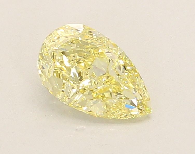 Loose Lab Diamond - IGI Pear 1.05ct Fancy Yellow VVS2: Loose Lab Diamond - IGI Pear 1.05ct Fancy Yellow VVS2 A stunning Fancy Yellow Lab diamond, certified by the International Gemological Institute (IGI), boasts exceptional clarity and polish, with a vib