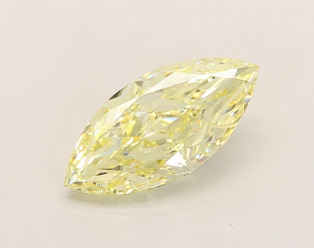 IGI Marquise 2.03ct Fancy Yellow VVS2 Loose Lab Diamond: IGI Marquise 2.03ct Fancy Yellow VVS2 Loose Lab Diamond A rare and radiant gem, this 2.03ct Fancy Yellow VVS2 loose lab diamond boasts exceptional clarity, cut, and polish, making it a true standout a