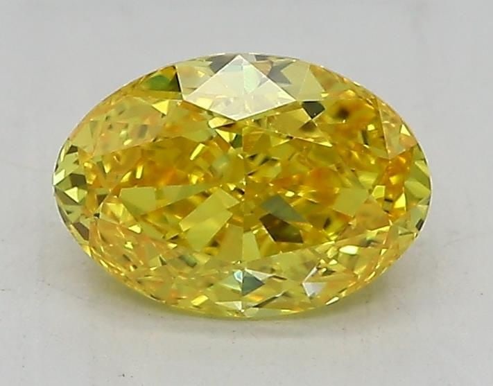 IGI Oval 1.05ct Fancy Vivid Yellow VVS2 Loose Lab Diamond: IGI Oval 1.05ct Fancy Vivid Yellow VVS2 Loose Lab Diamond Experience the brilliance of nature in a lab-grown wonder - this 1.05ct Fancy Vivid Yellow VVS2 diamond is a true gem, boasting exceptional cl