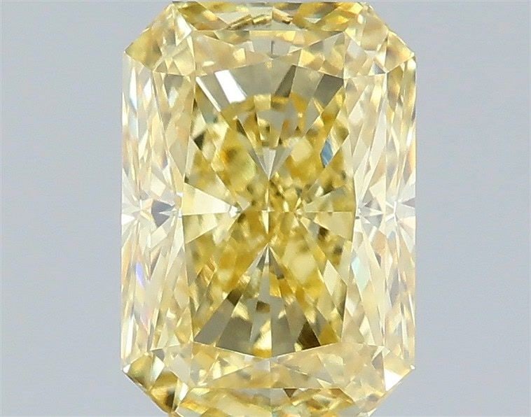IGI Radiant 1.59ct Fancy Intense Yellow VVS2 Loose Lab Diamond: IGI Radiant 1.59ct Fancy Intense Yellow VVS2 Loose Lab Diamond Experience the vibrant beauty of nature in this stunning 1.59ct Fancy Intense Yellow VVS2 lab-grown diamond, boasting exceptional
