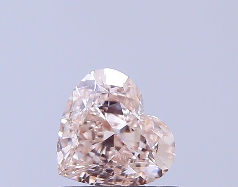 Loose Lab Diamond - IGI Heart 1.03ct Fancy Light Pinkish Brown VVS2: Loose Lab Diamond - IGI Heart 1.03ct Fancy Light Pinkish Brown VVS2 A stunning lab-grown diamond, certified by the International Gemological Institute (IGI), boasts an exceptional 1.03 carat Fancy Lig