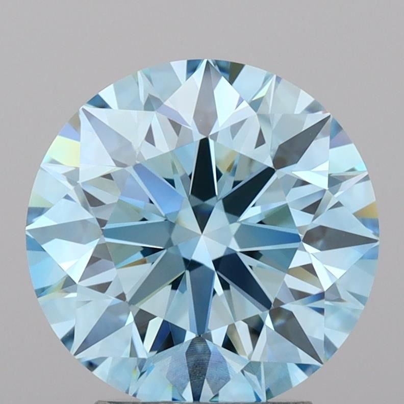 IGI Round 3.46ct Fancy Vivid Blue VVS2 Ideal Loose Lab Diamond: IGI Round 3.46ct Fancy Vivid Blue VVS2 Ideal Loose Lab Diamond Experience the unparalleled beauty of a lab-grown Fancy Vivid Blue diamond, certified by the International Gemological Institute (IGI). T