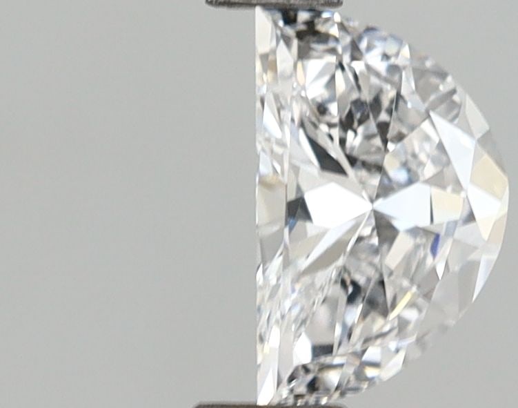 Loose Lab Diamond - IGI Half Moon 0.54ct E VVS2: Loose Lab Diamond - IGI Half Moon 0.54ct E VVS2 Experience the brilliance of a lab-grown diamond, certified by IGI as an exceptional 0.54ct E VVS2 half moon cut. This exquisite stone boasts vibrant co