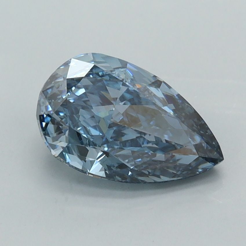 Loose Lab Diamond - IGI Pear 1.57ct Fancy Vivid Blue VVS2: Loose Lab Diamond - IGI Pear 1.57ct Fancy Vivid Blue VVS2 Experience the rare beauty of a lab-grown diamond, boasting an exceptional 1.57ct Fancy Vivid Blue hue that shines with unparalleled clarity a
