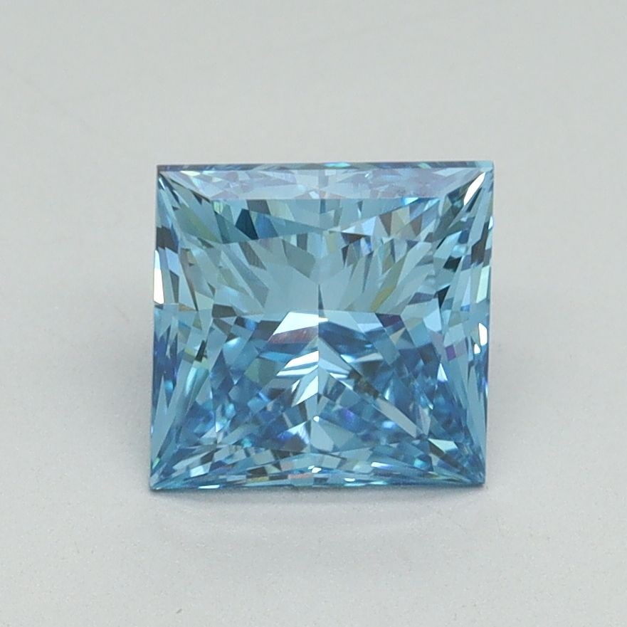 IGI Princess 1.66ct Fancy Vivid Blue VVS2 Loose Lab Diamond: IGI Princess 1.66ct Fancy Vivid Blue VVS2 Loose Lab Diamond Experience the breathtaking beauty of a Fancy Vivid Blue diamond, one of the rarest and most coveted colors in nature. This exquisite 1.66ct