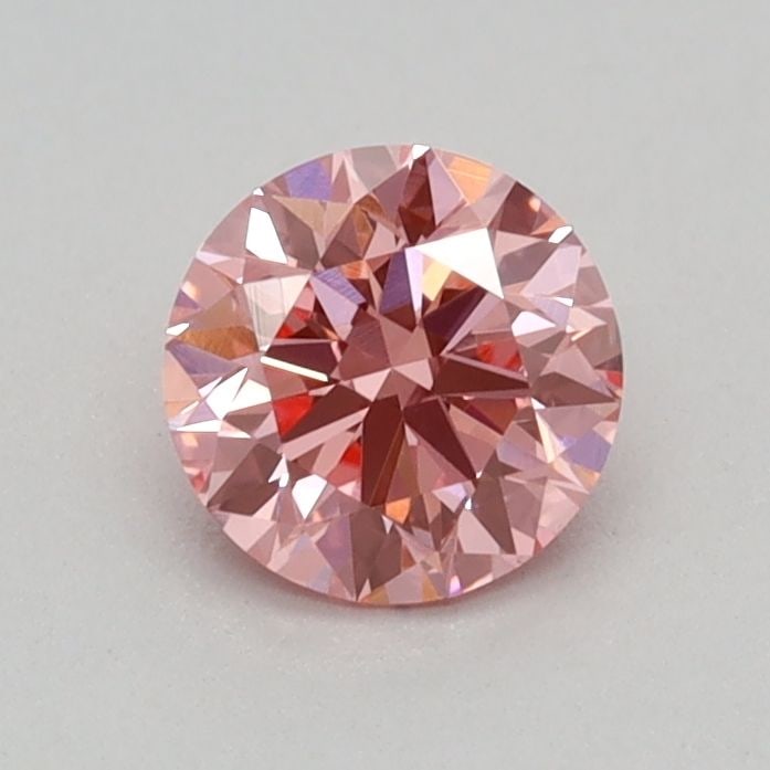 IGI Round 0.34ct Fancy Vivid Pink VVS2 Loose Lab Diamond: IGI Round 0.34ct Fancy Vivid Pink VVS2 Loose Lab Diamond Experience the rarity of a Fancy Vivid Pink diamond, one of the most coveted colors in the world of gemstones. This 0.34ct IGI-certified lab-gr
