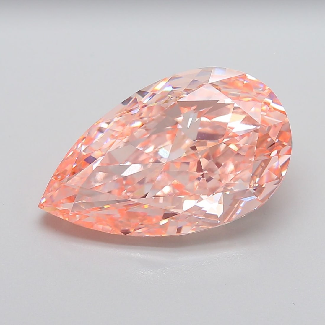Loose Lab Diamond - IGI Pear 13.89ct Fancy Intense Pink VVS2: Loose Lab Diamond - IGI Pear 13.89ct Fancy Intense Pink VVS2 Experience the unparalleled beauty of a lab-grown diamond, certified by the International Gemological Institute (IGI) as a Fancy Intense Pi