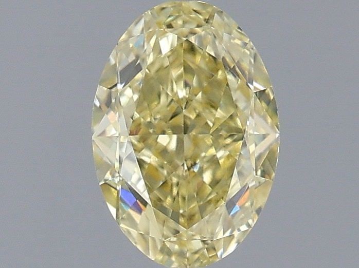 IGI Oval 1.15ct Fancy Yellow VVS2 Loose Lab Diamond: IGI Oval 1.15ct Fancy Yellow VVS2 Loose Lab Diamond Experience the beauty of nature in a lab-grown diamond, certified by IGI as Fancy Yellow VVS2. This exceptional 1.15ct stone boasts an EX polish and