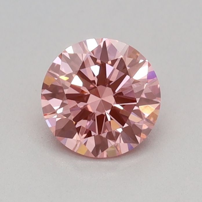 IGI Round 0.31ct Fancy Vivid Pink VVS2 Loose Lab Diamond: IGI Round 0.31ct Fancy Vivid Pink VVS2 Loose Lab Diamond Experience the rare beauty of a Fancy Vivid Pink diamond, one of the most coveted colors in the world of gemstones. This exquisite 0.31ct lab-g