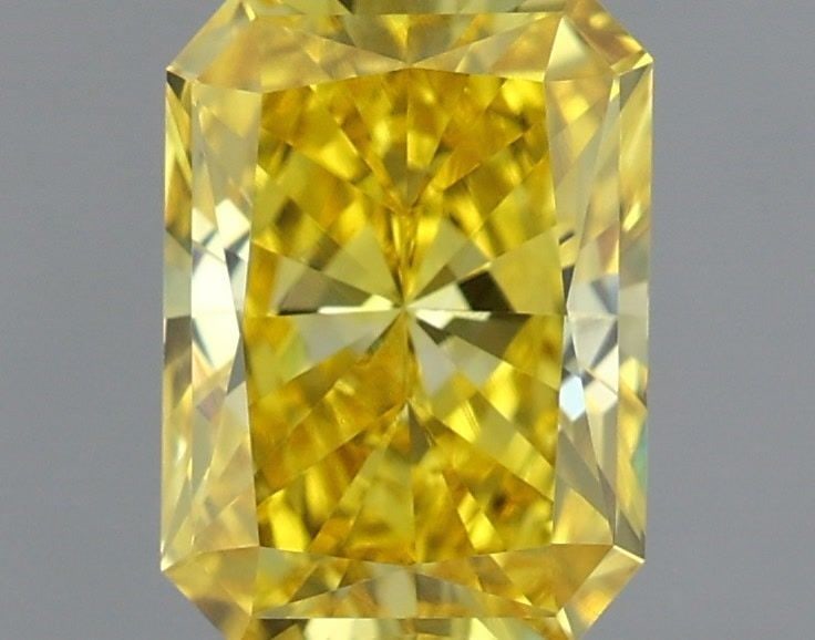 IGI Radiant 0.74ct Fancy Vivid Yellow VVS2 Loose Lab Diamond: IGI Radiant 0.74ct Fancy Vivid Yellow VVS2 Loose Lab Diamond Experience the vibrant beauty of nature in a lab-grown diamond, certified by IGI as Fancy Vivid Yellow with exceptional clarity and cut. Th