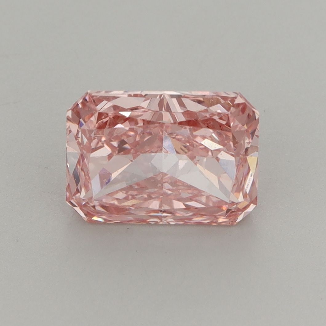 IGI Radiant 2.09ct Fancy Vivid Pink VVS2 Loose Lab Diamond: IGI Radiant 2.09ct Fancy Vivid Pink VVS2 Loose Lab Diamond Experience the unparalleled beauty of a lab-grown diamond, certified by IGI as Fancy Vivid Pink with exceptional clarity and cut. This stunni