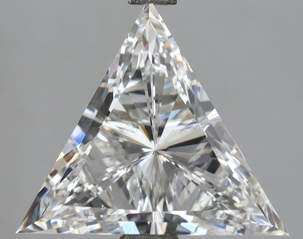 IGI Triangular 3.28ct E VVS2 Loose Lab Diamond: IGI Triangular 3.28ct E VVS2 Loose Lab Diamond A rare and exceptional find, this IGI-certified lab-grown diamond boasts an impressive 3.28 carats of unparalleled brilliance, with its E color and VVS2