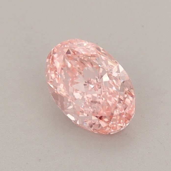 IGI Oval 0.55ct Fancy Vivid Pink VVS2 Loose Lab Diamond: IGI Oval 0.55ct Fancy Vivid Pink VVS2 Loose Lab Diamond Experience the beauty of nature with this stunning 0.55ct Fancy Vivid Pink VVS2 lab-grown diamond, certified by the International Gemological